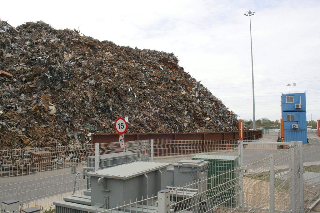Scrap metal piled in an industrial area